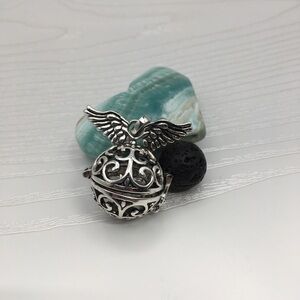 Heart & Wings Aromatherapy Silver tone Locket.  Lava stone included.